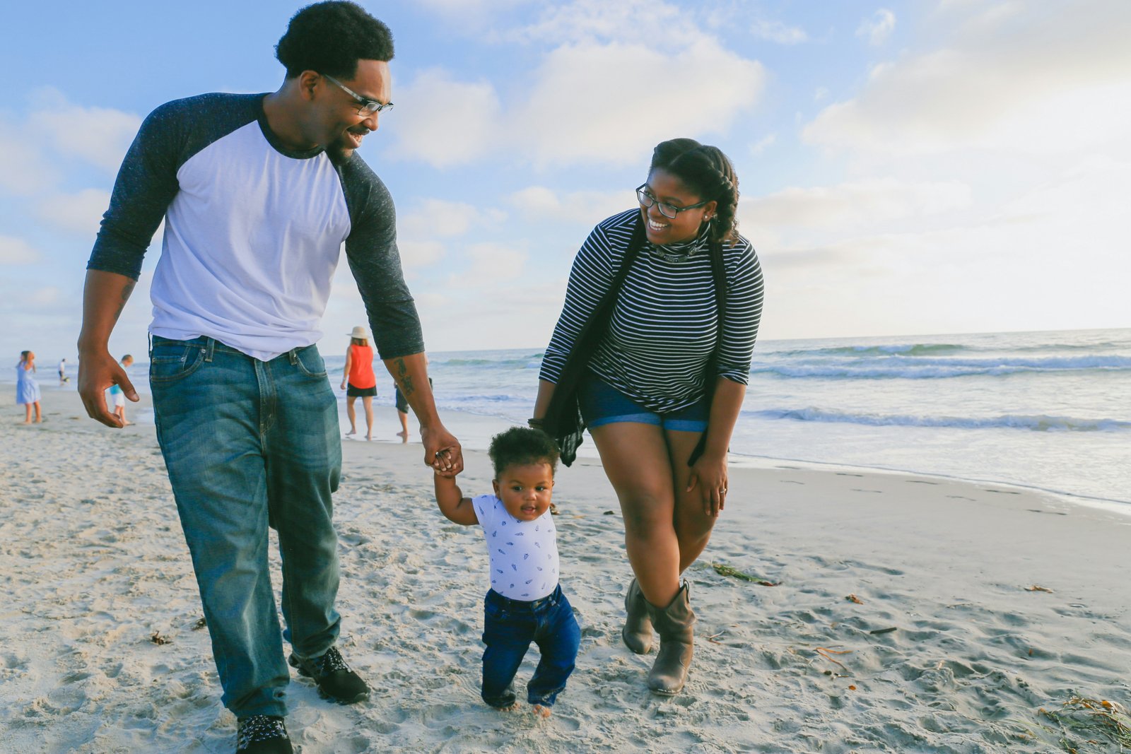 Black family embracing together